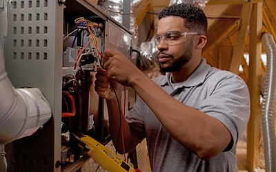 Man fixing furnace